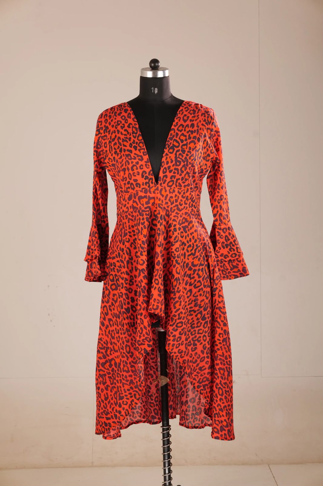 Before: red leopard-print dress on a mannequin